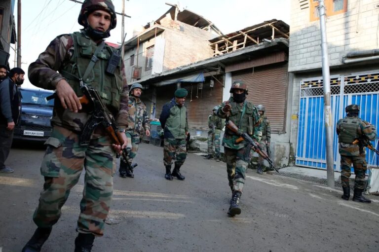 Indian soldiers patrol a tense neighborhood in Kashmir amid the ongoing India-Pakistan conflict escalation.