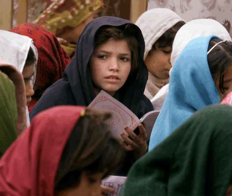 Young Afghan girls in school before Pakistan's Afghan repatriation plan forced returns in April 2025