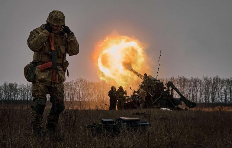 Ukrainian artillery unit fires a howitzer during frontline operations despite the Ukraine-Russia Easter truce announcement.