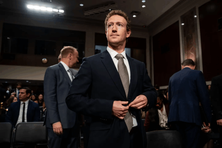 Mark Zuckerberg stands before a congressional hearing, buttoning his jacket before testifying on Meta’s antitrust case and his $450M settlement offer.