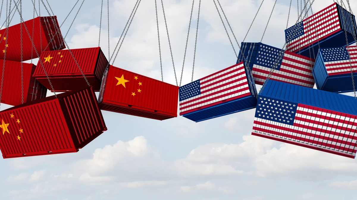 Symbolic image of U.S. and Chinese shipping containers colliding, representing economic tensions during the US-China tariff pause.