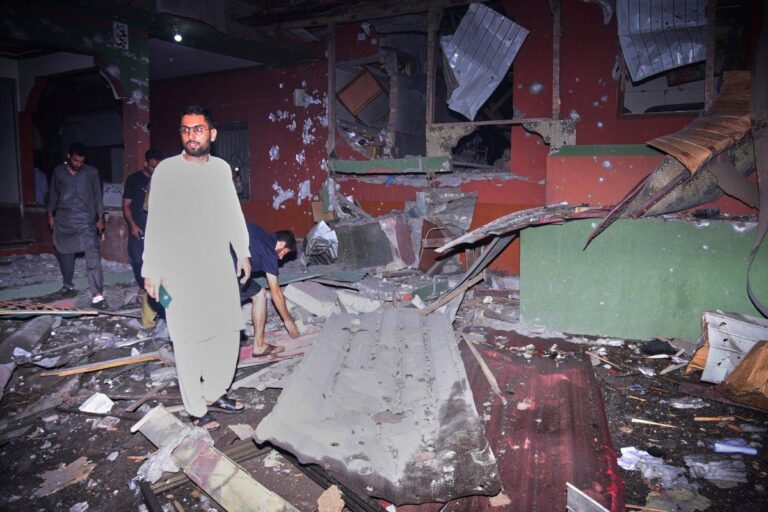 Residents inspect damage inside a mosque reportedly hit during Indian airstrikes, as India-Pakistan tensions escalate across the region.