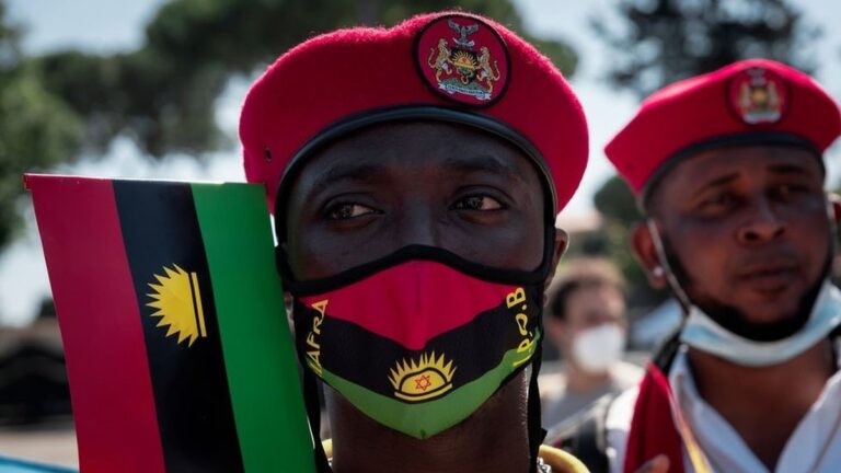 IPOB supporters wear red berets and Biafran flags during a protest amid rising separatist violence in Nigeria.