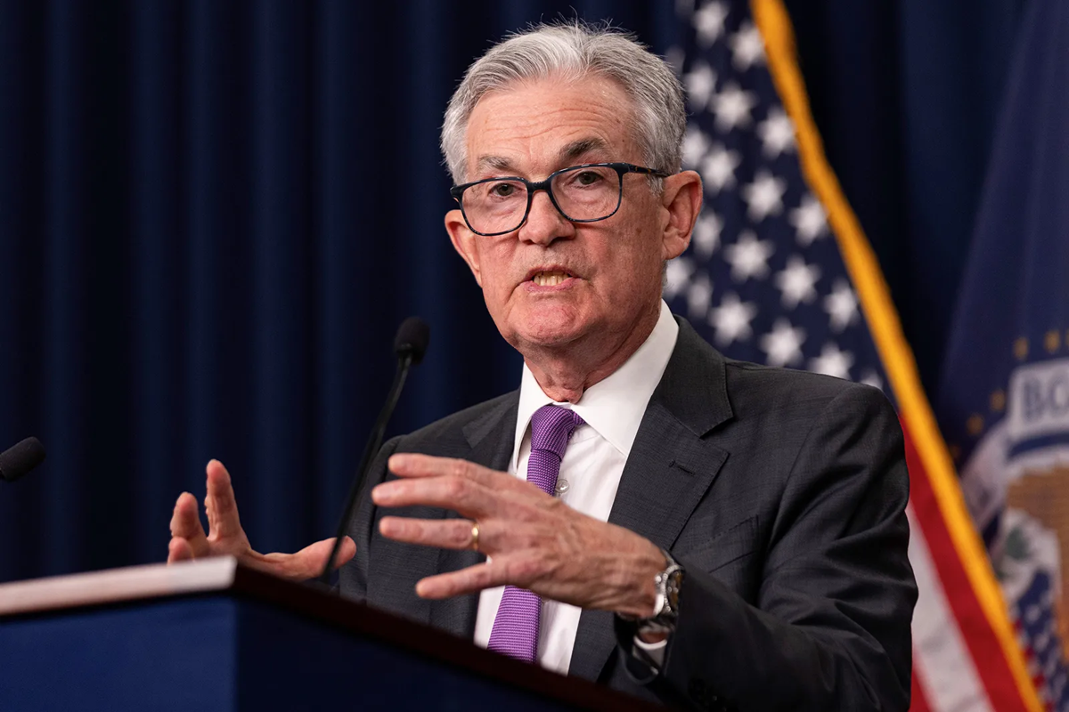 Jerome Powell speaks at a press conference as long-term rates likely higher becomes part of the Fed’s outlook.