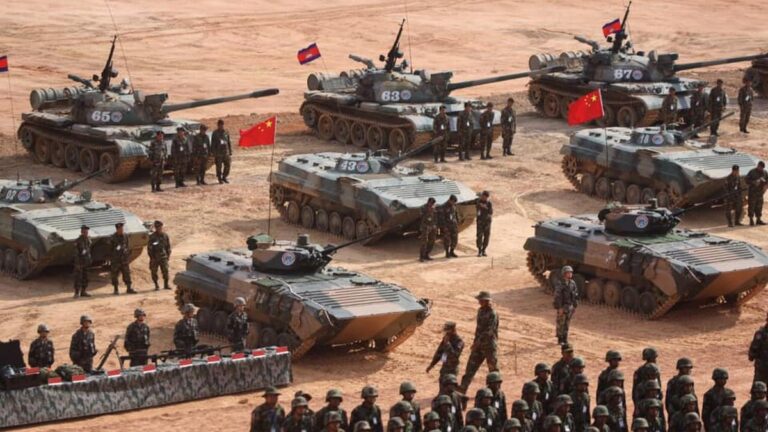 Chinese and Cambodian armored vehicles and soldiers assemble during China Cambodia military drills, May 2025.